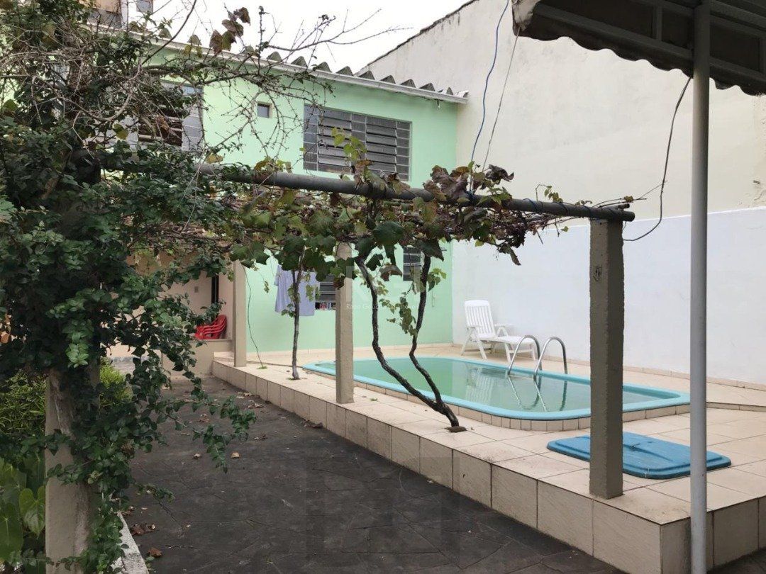 Casa residencial/comercial, com 350m² privativos, 4 quartos, 5 vagas de garagem - Bairro Tristeza — foto 11