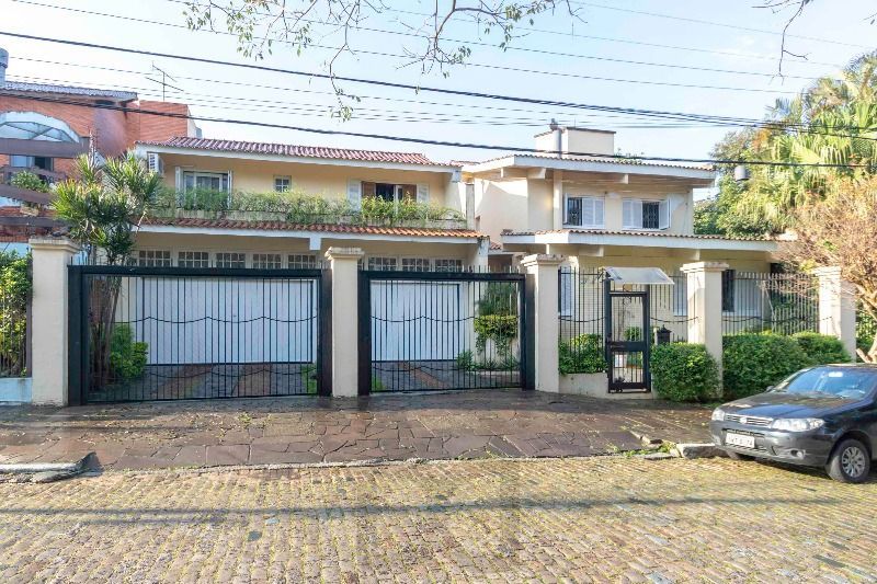Casa para Venda - 420m², 5 dormitórios, sendo 2 suites, 6 vagas - Nonoai — foto 1