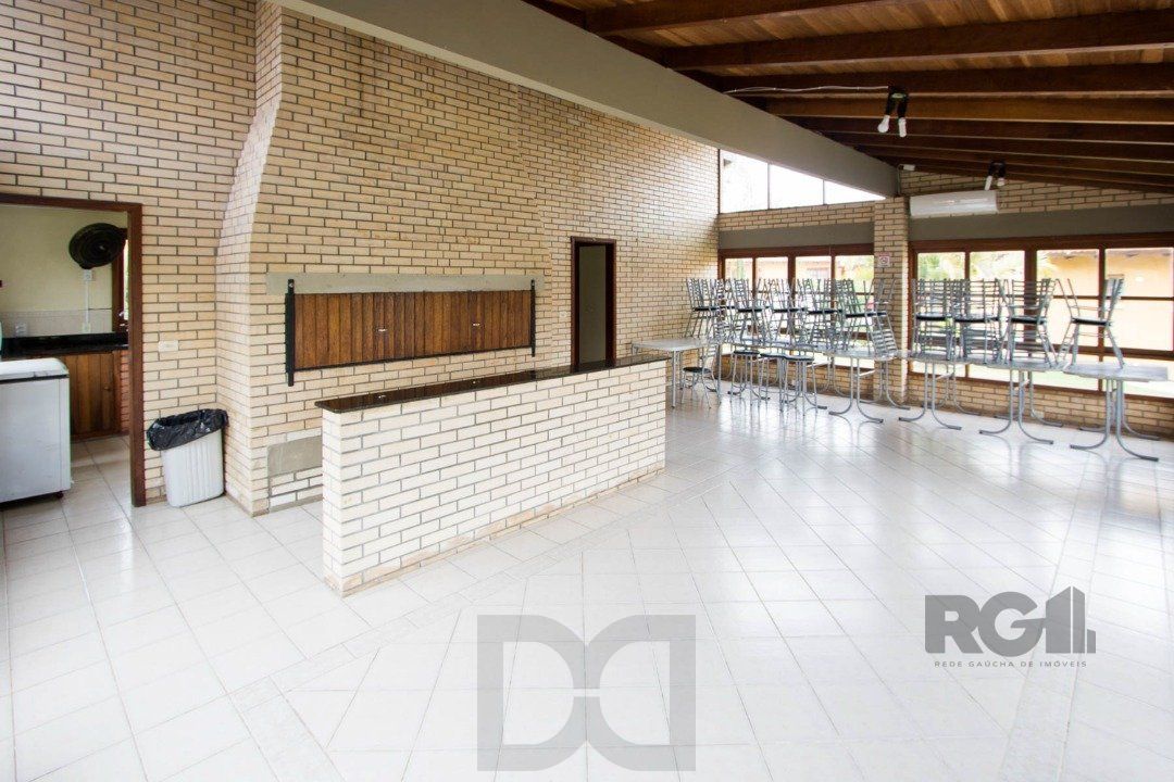Casa em Condomínio na Zona Sul, no bairro Hípica, com 2 dormitórios, living para dois ambientes, cozinha mobiliada, lavabo — foto 37