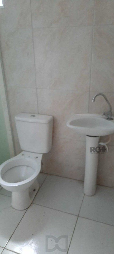 Oportunidade Imperdível: Prédio com 4 Apartamentos, Pátio e 2 Vagas de Garagem — foto 36