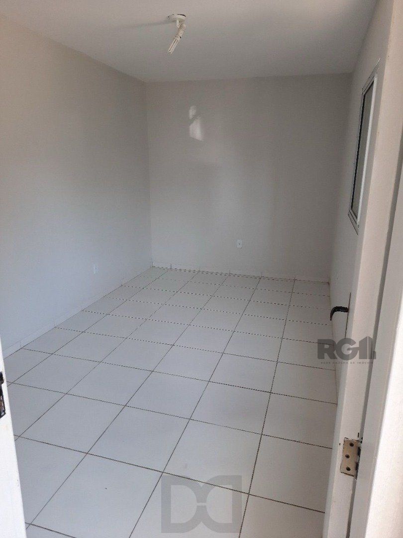 Oportunidade Imperdível: Prédio com 4 Apartamentos, Pátio e 2 Vagas de Garagem — foto 6