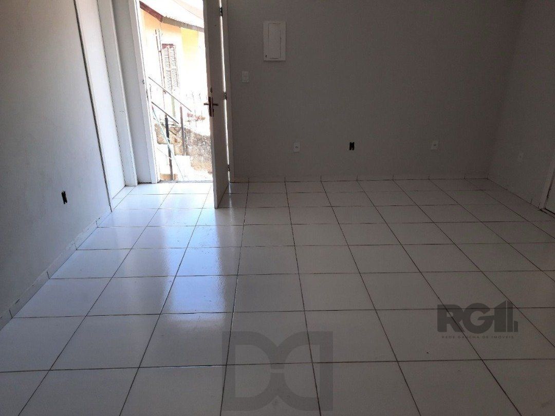 Oportunidade Imperdível: Prédio com 4 Apartamentos, Pátio e 2 Vagas de Garagem — foto 8
