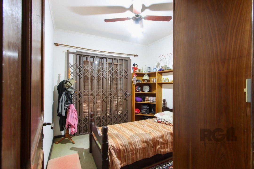 Casa a venda com 03 dormitórios, living 03 ambientes com vista para o Rio. — foto 49