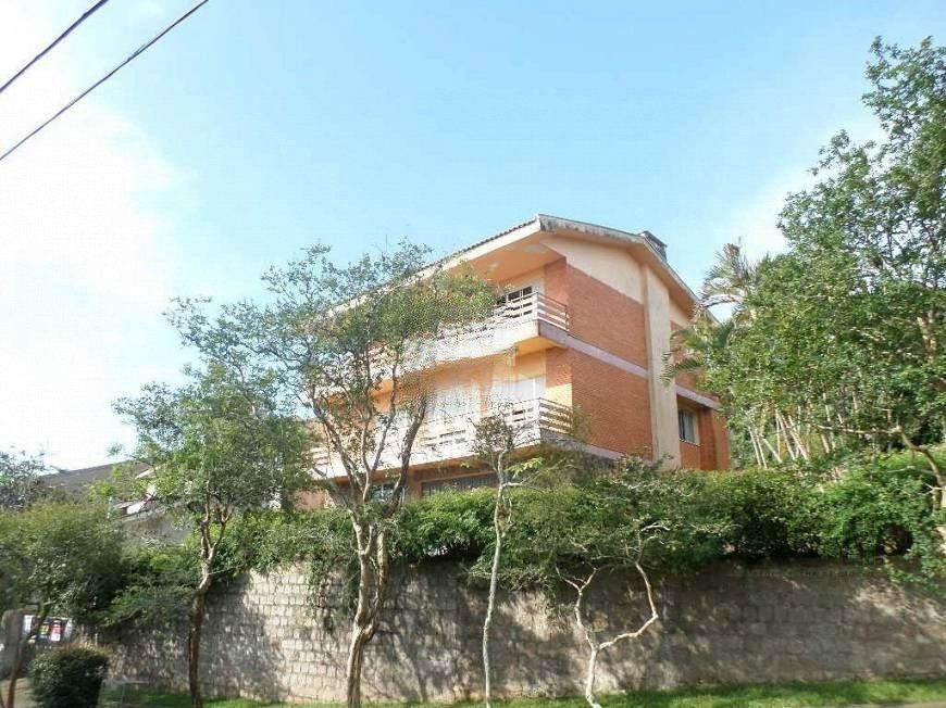 residência com vista panorâmica espetacular para o Guaíba em todos os cômodos da casa, hall de entrada, gabinete, lavabo, living para três ambientes com sacada e vista — foto 2