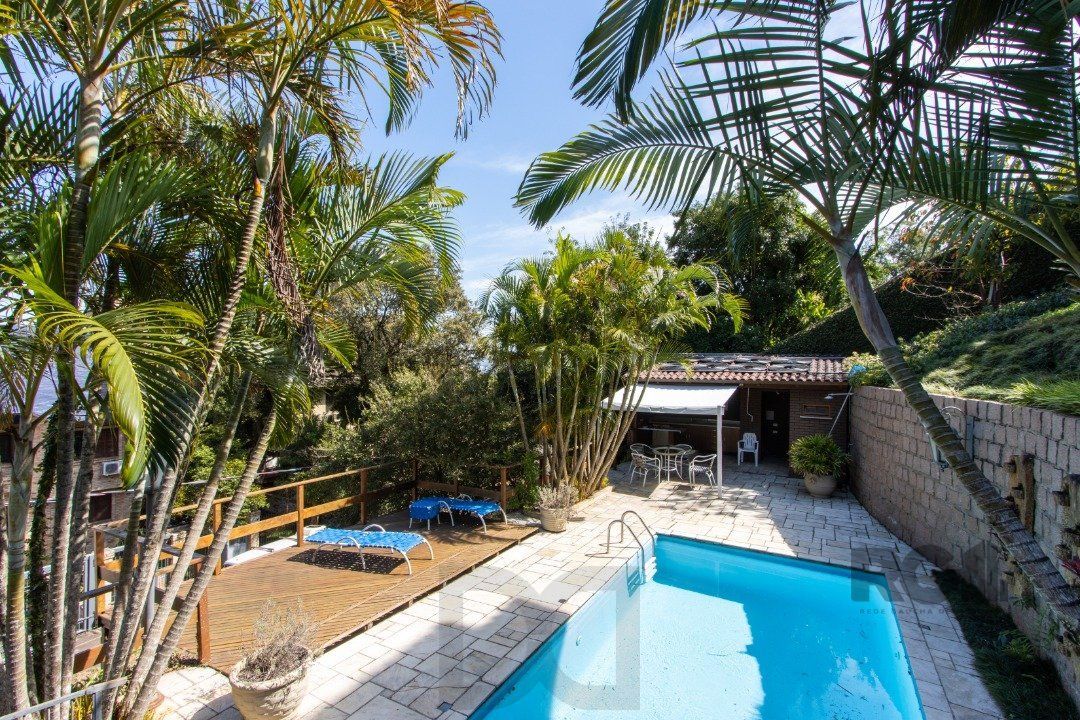 Casa deslumbrante vista do Guaiba, 3 dormitórios, sendo 1 suite master com closet e banheira de hidro com vista para o rio — foto 41