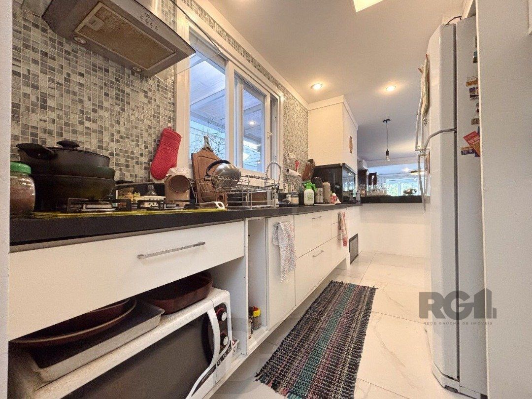 Casa em condomínio com pátio, piscina, 3 suítes e 2 vagas — foto 17