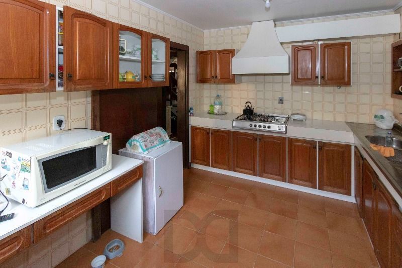 Casa para Venda - 420m², 5 dormitórios, sendo 2 suites, 6 vagas - Nonoai — foto 13