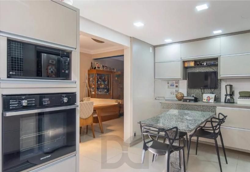 Linda casa com 3 dormitórios, sendo 1 Suíte, Sala Ampla no Condomínio de Ótima Localização — foto 9
