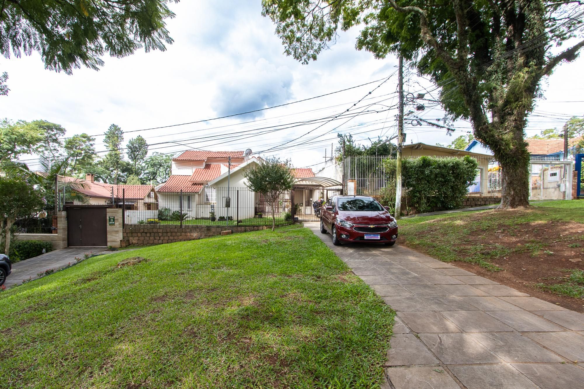 Casa de 4 dormitórios, 2 suítes, piscina, pátio e 2 vagas de garagem. — foto 5
