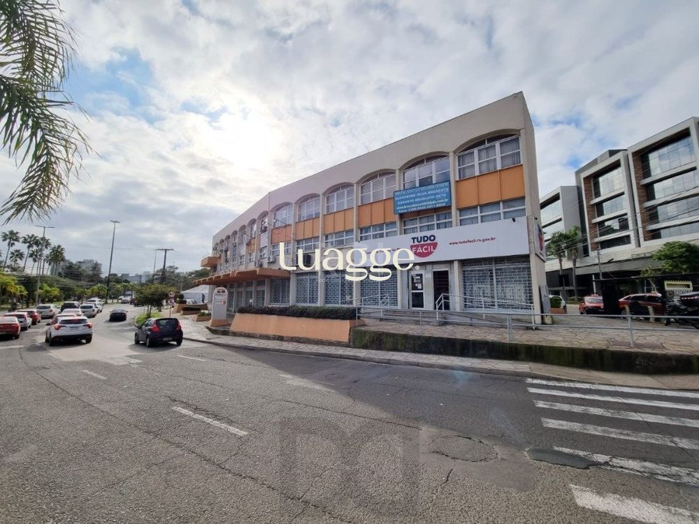 Sala comercial com 22m² de área privativa, frente, piso cerâmico, equipada com lavabo e ar-condicionado split — foto 2