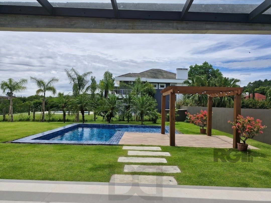 Casa térrea com piscina, no Condominio Terra Ville com 380,27m2 e 3 suites. — foto 4