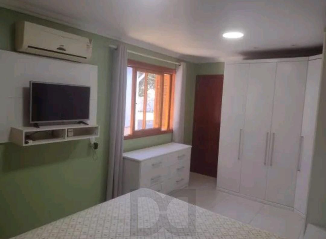Casa á venda com 3 dormitórios no bairro Lomba do Pinheiro em Porto Alegre. — foto 2