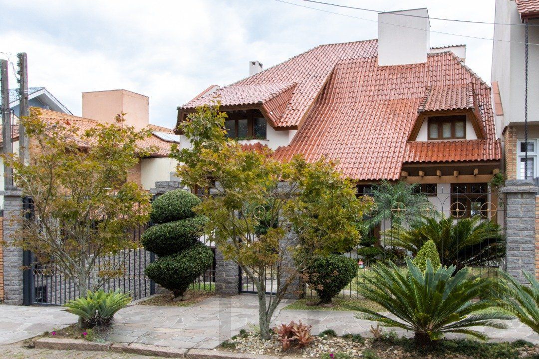 Casa para Venda com 4 dormitórios, sendo 2 suites e 4 vagas no bairro Jardim Isabel — foto 1