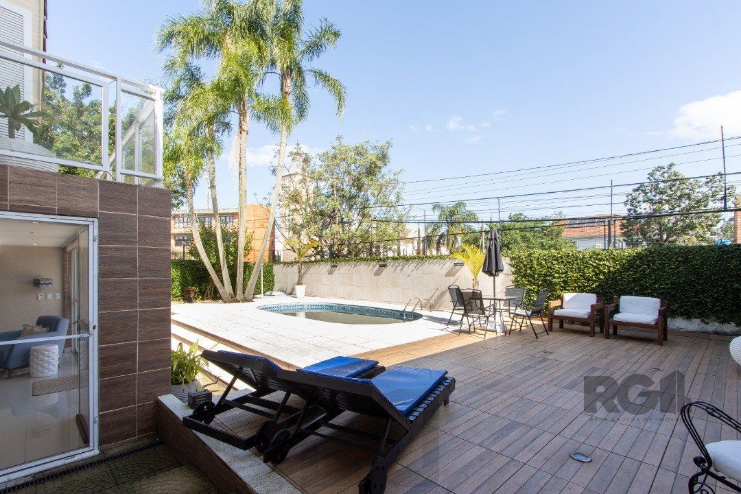 Casa a venda no bairro Guarujá com 4 dormitórios, piscina e salão de festas — foto 24