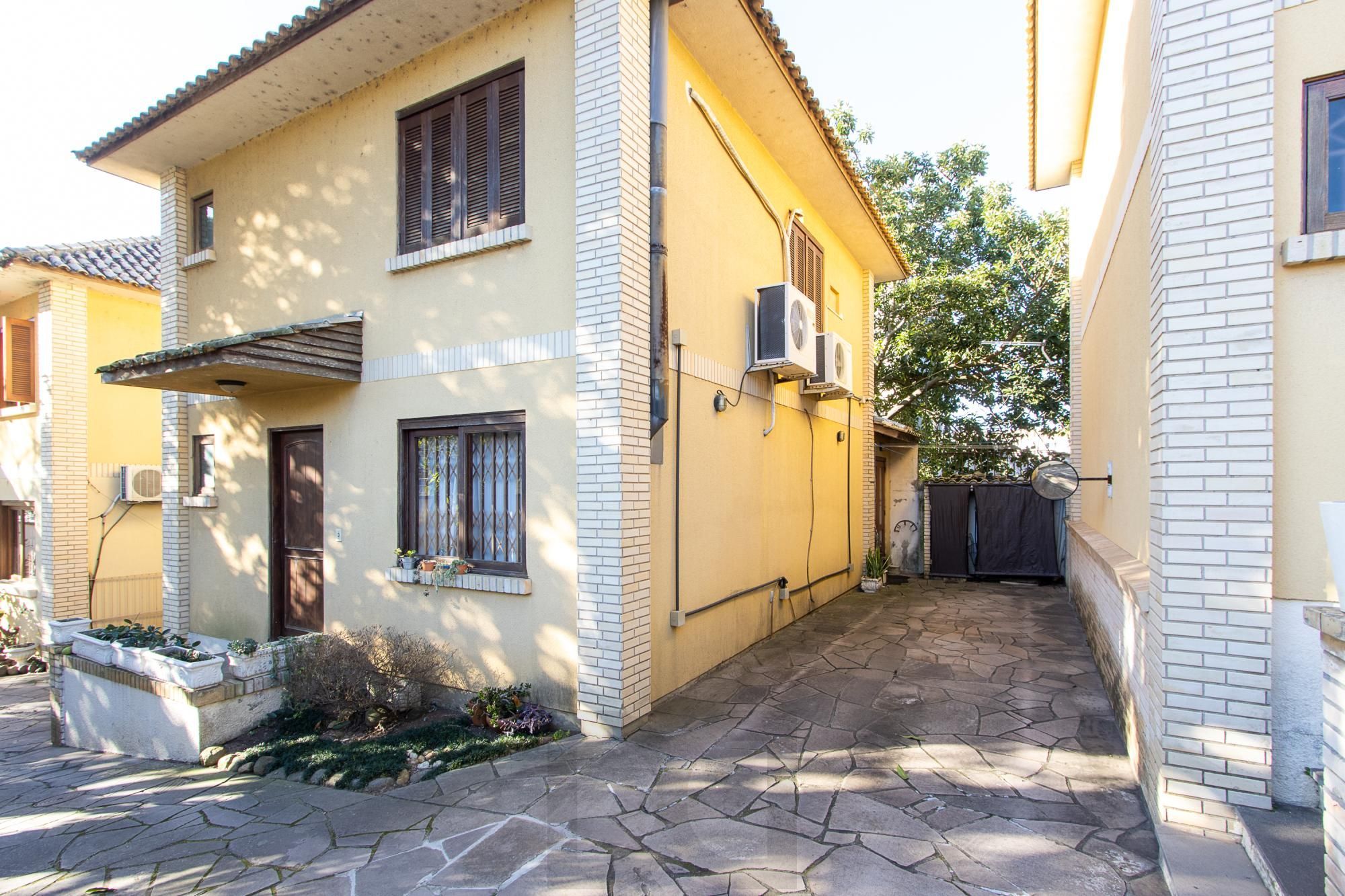 Casa 3 dormitórios, 1 suíte, 2 vagas - Bairro Camaquã — foto 2