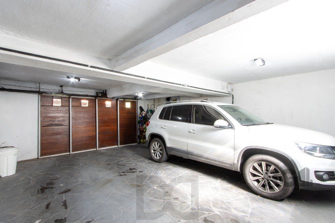 Casa a venda no bairro Guarujá com 4 dormitórios, piscina e salão de festas — foto 38