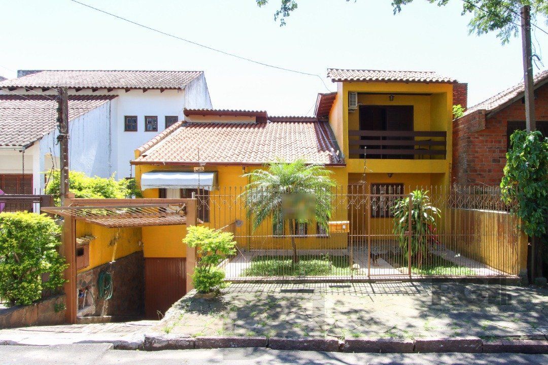 Casa 04 dormitórios, 02 suítes, living 02 ambientes — foto 1