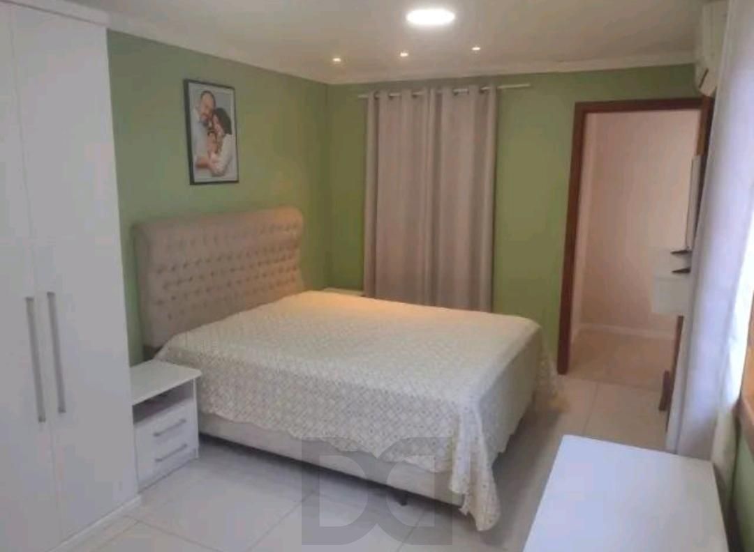 Casa á venda com 3 dormitórios no bairro Lomba do Pinheiro em Porto Alegre. — foto 1