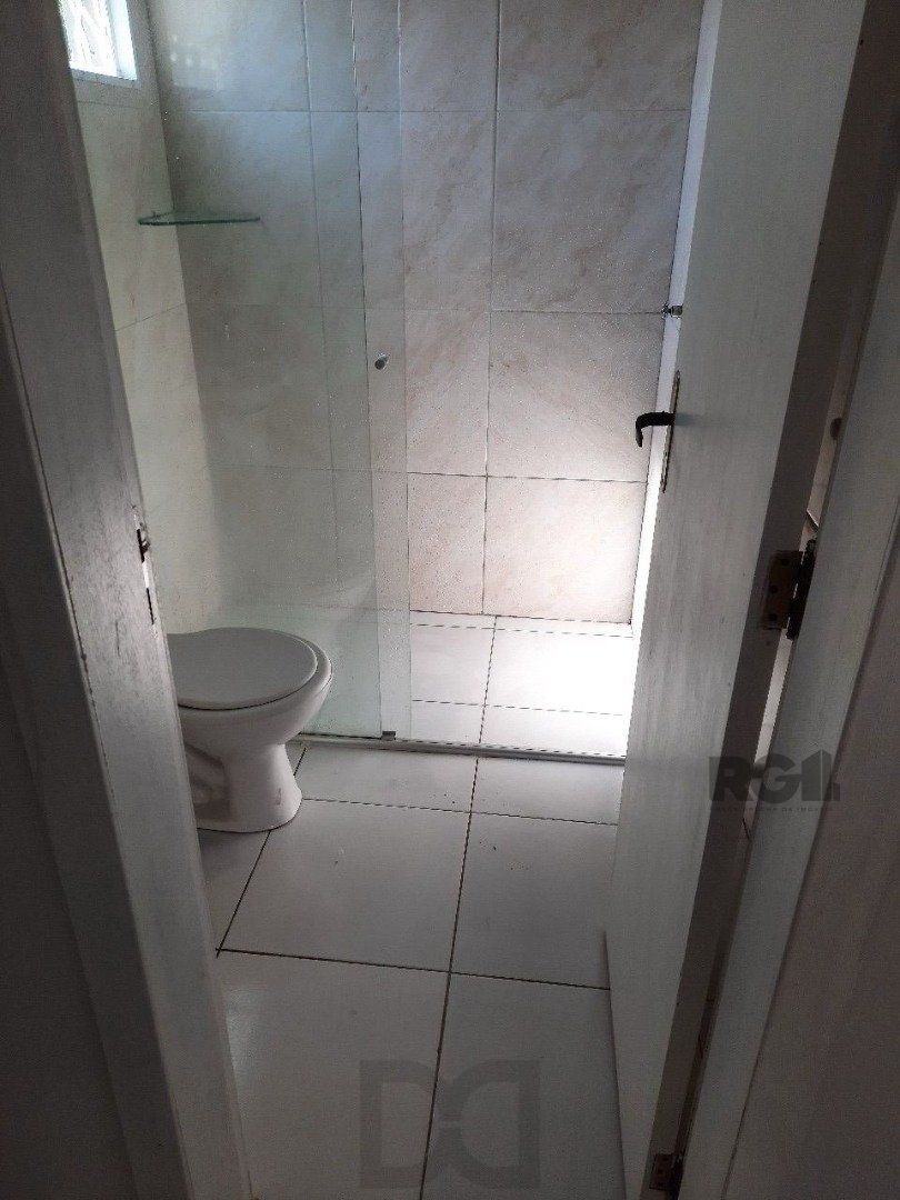 Oportunidade Imperdível: Prédio com 4 Apartamentos, Pátio e 2 Vagas de Garagem — foto 5