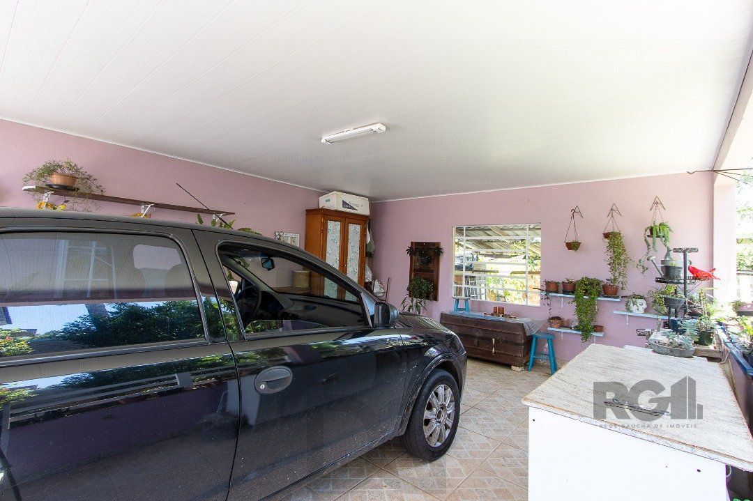 Casa com 4 quartos, suíte, churrasqueira, lareira, garagem coberta e lindo jardim. — foto 56
