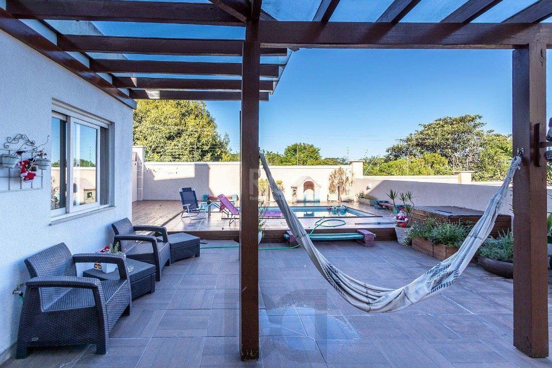 Casa para Venda com 4 dormitórios no bairro Hípica — foto 18