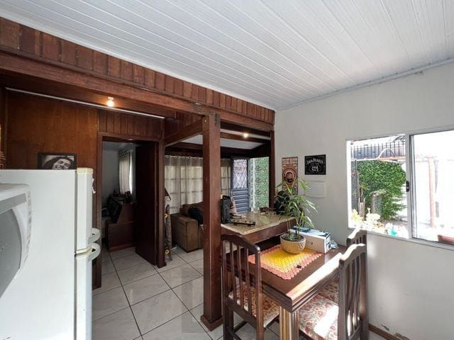 Terreno medindo 11 X 39,66 com 2 casas de alvenaria - Bairro Guarujá — foto 6