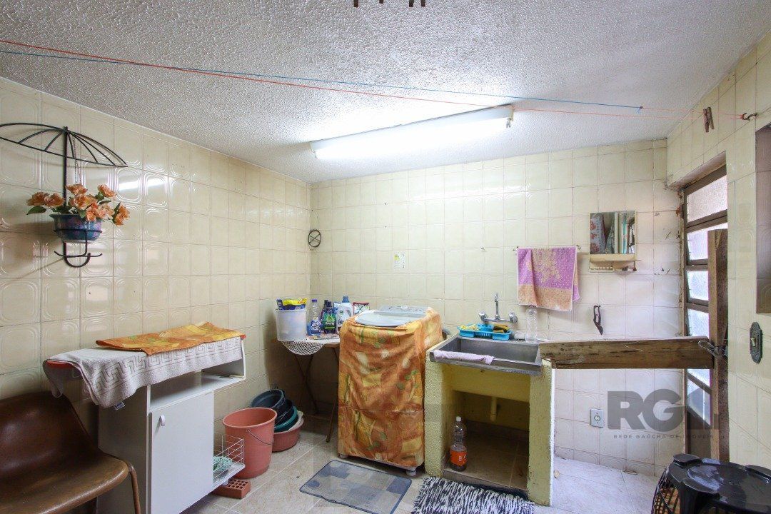 Casa a venda com 03 dormitórios, living 03 ambientes com vista para o Rio. — foto 74