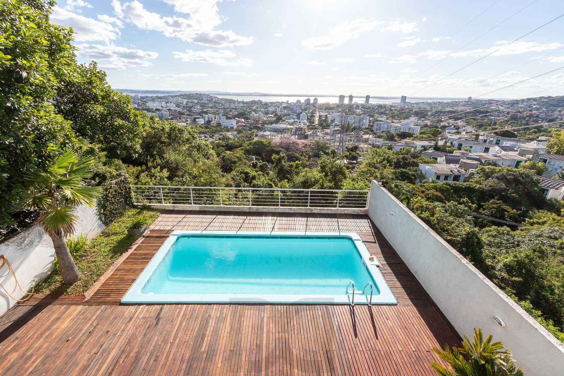 Casa para Venda - 470m², 3 dormitórios, sendo 1 suites, 6 vagas - Nonoai — foto 22