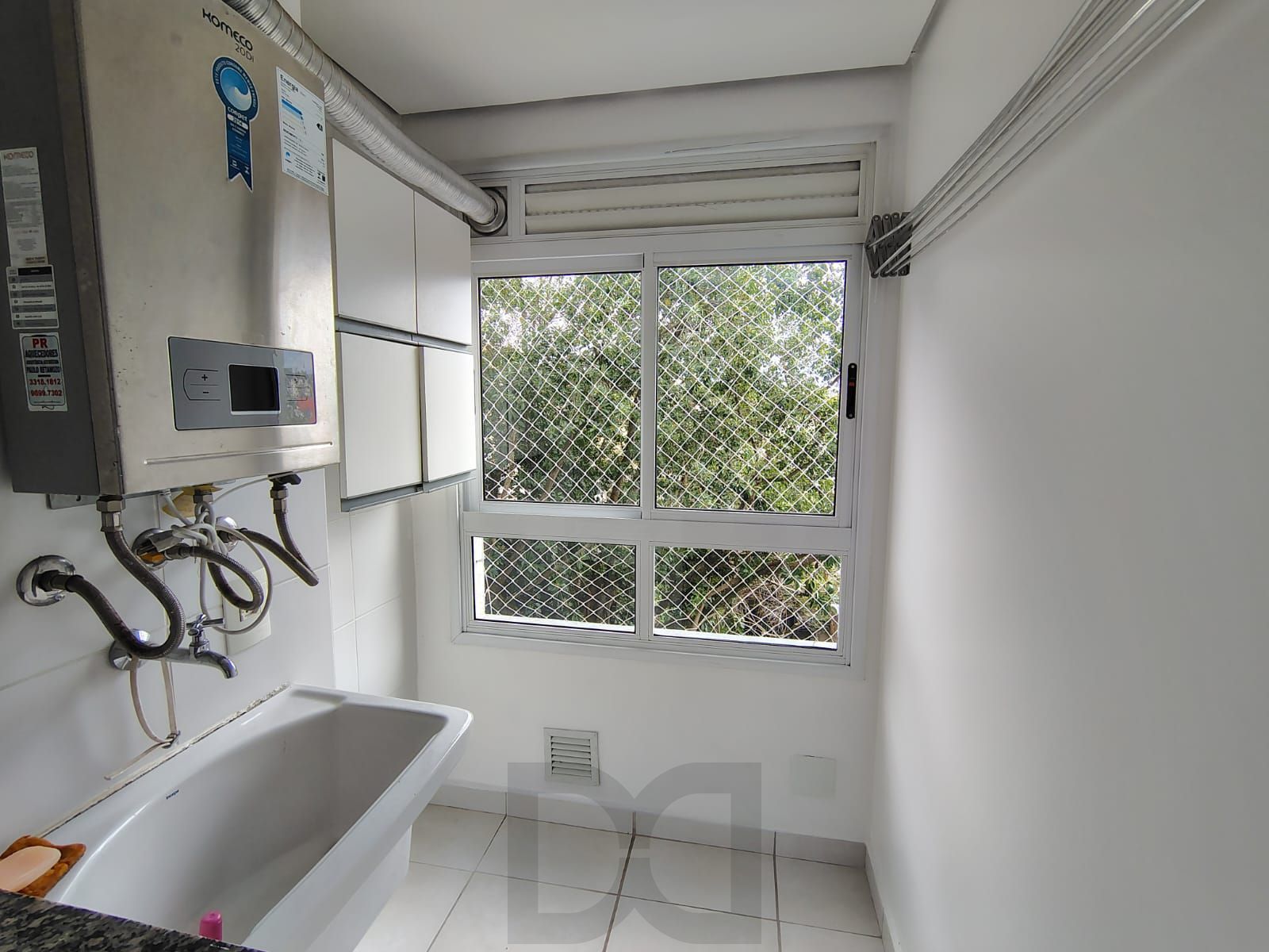 Apartamento de 2 dormitórios, living, cozinha planejada, área de serviço, banheiro social e 1 vaga de garagem escriturada. — foto 8