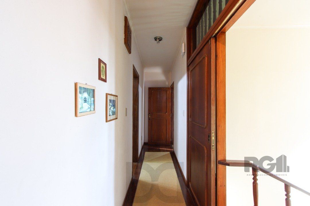 Casa a venda com 03 dormitórios, living 03 ambientes com vista para o Rio. — foto 26