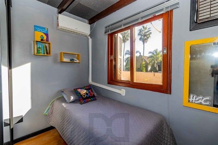 Casa de 3 dormitórios, em condomínio fechado na zona sul de Porto Alegre, com lareira, churrasqueira e vaga de garagem. — foto 8