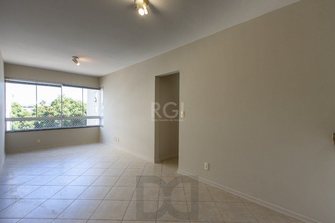 APARTAMENTO DE 3 DORMITÓRIOS EM CONDOMÍNIO FECHADO NA CAVALHADA — foto 1