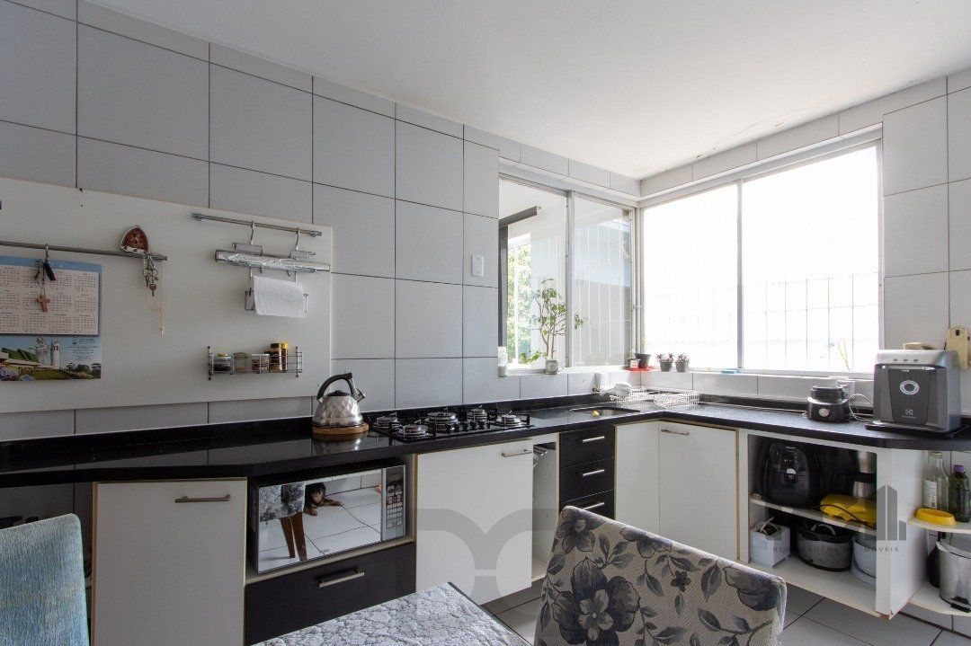 Casa, 5 dormitórios, sendo 1 suíte, 312m² privativos, 8 vagas - Bairro Vila Nova — foto 12
