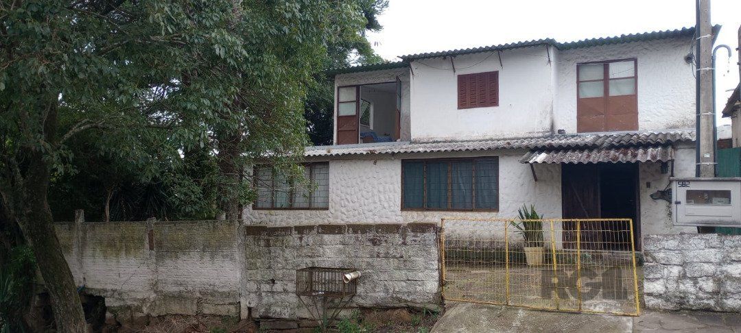 Casa 5 dormitórios, bairro Camaquã. — foto 1