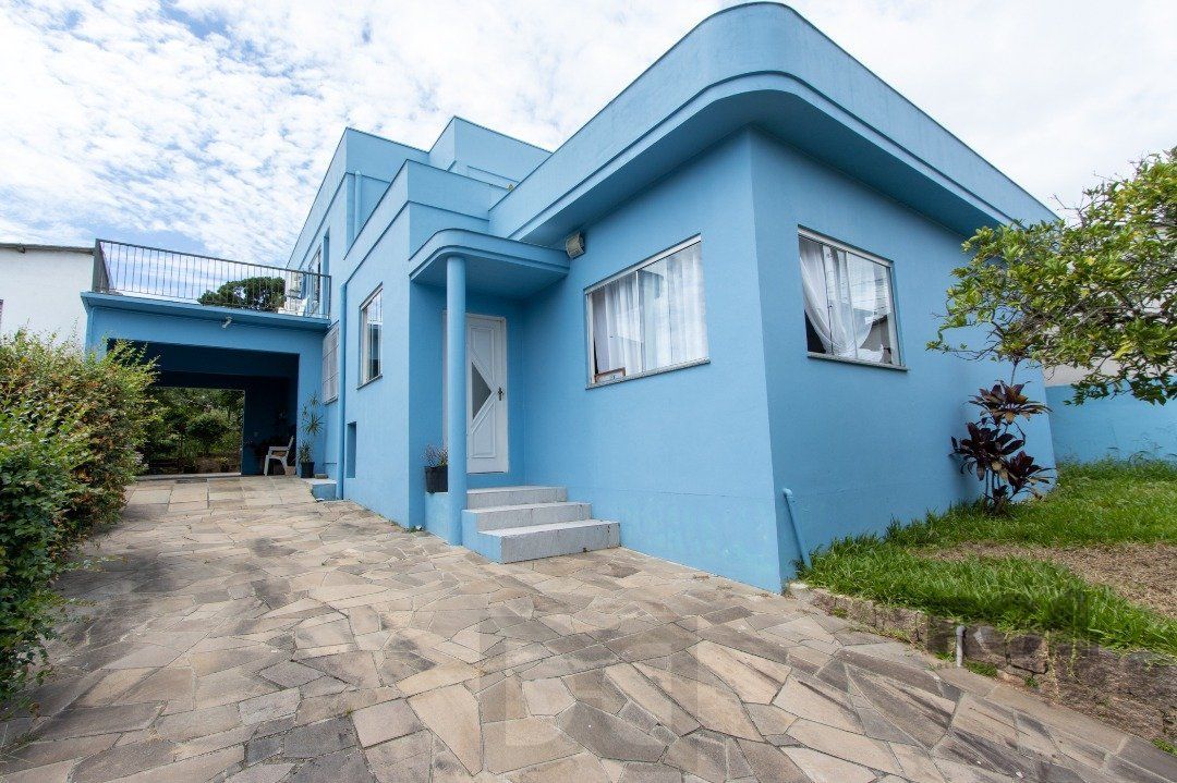 Casa, 5 dormitórios, sendo 1 suíte, 312m² privativos, 8 vagas - Bairro Vila Nova — foto 3