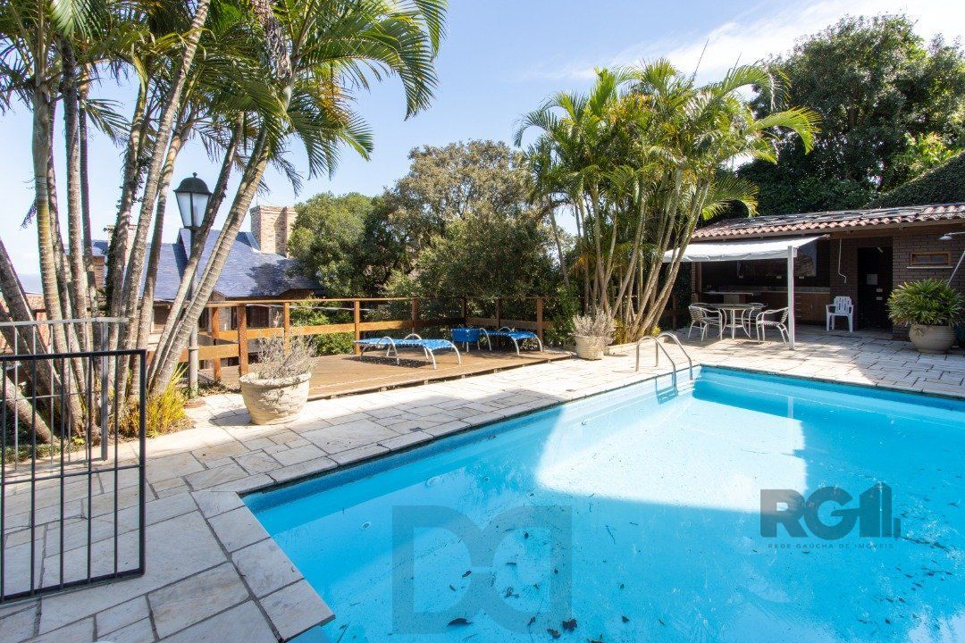 Casa deslumbrante vista do Guaiba, 3 dormitórios, sendo 1 suite master com closet e banheira de hidro com vista para o rio — foto 44