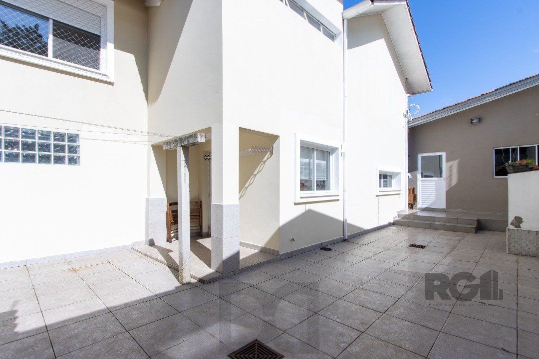 Casa a venda no bairro Guarujá com 4 dormitórios, piscina e salão de festas — foto 22