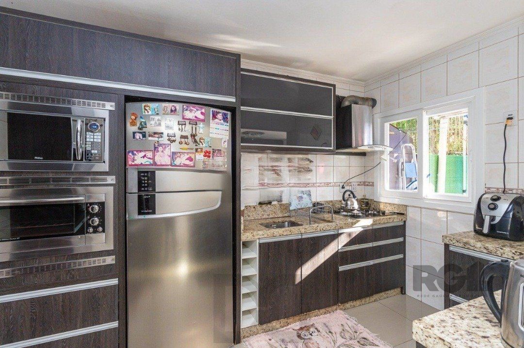 BELÍSSIMA CASA 3 SUÍTES NO CORAÇÃO DO BAIRRO TRISTEZA — foto 6