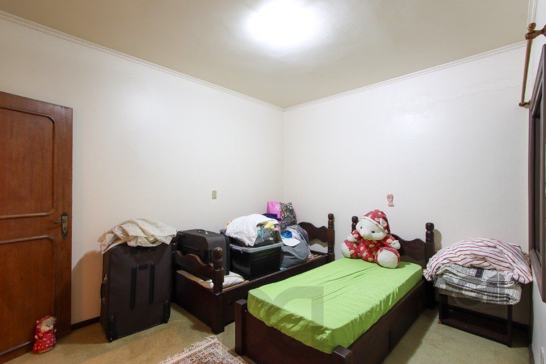 Casa a venda com 03 dormitórios, living 03 ambientes com vista para o Rio. — foto 43