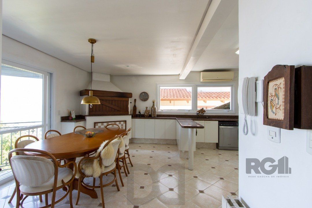Casa deslumbrante vista do Guaiba, 3 dormitórios, sendo 1 suite master com closet e banheira de hidro com vista para o rio — foto 15
