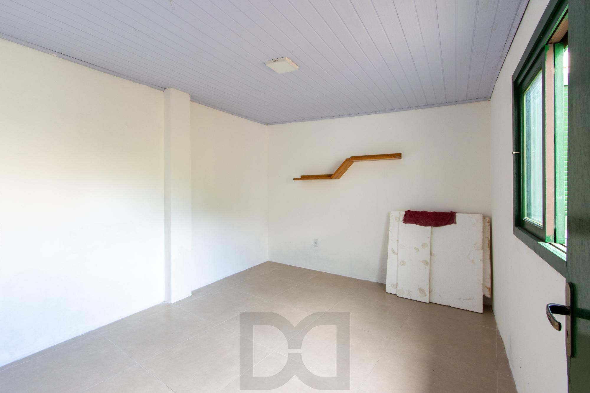 Terreno medindo 11 X 39,66 com 2 casas de alvenaria - Bairro Guarujá — foto 20