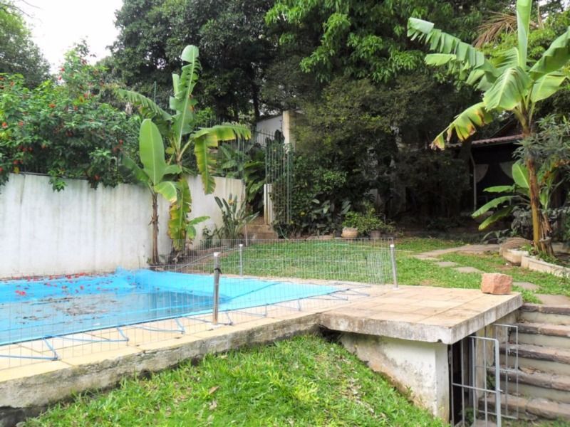 Casa para Venda - 290m², 3 dormitórios, sendo 1 suites, 3 vagas - Nonoai — foto 14