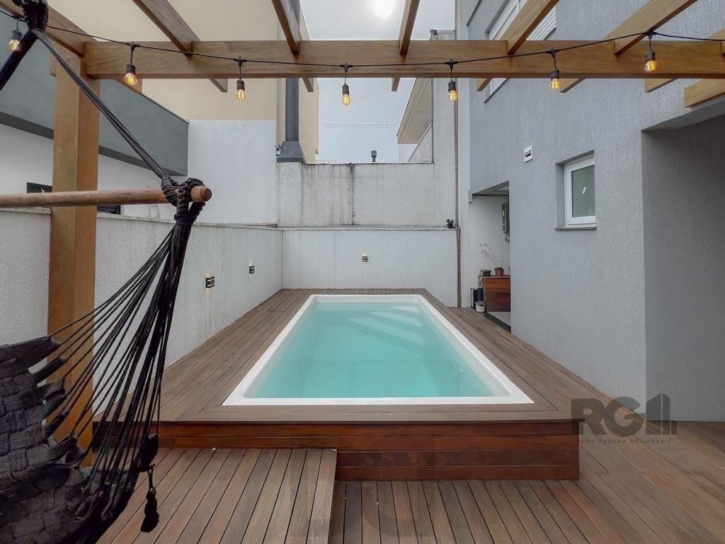 Encantadora residência em condomínio fechado no bairro Hípica. — foto 12