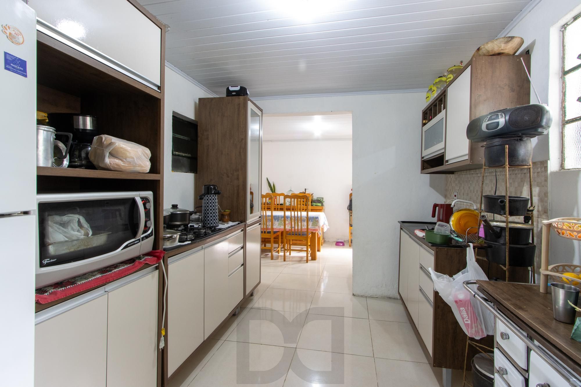 Casa ampla de 2 pavimentos com 4 dormitórios, 1 suite e 4 vagas no bairro Santa Tereza! — foto 16