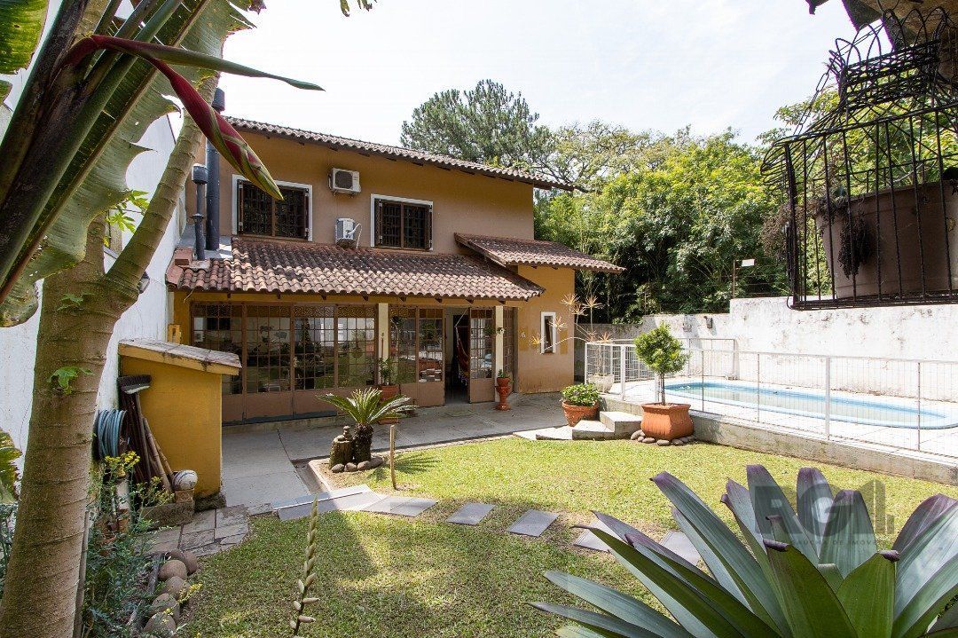 Casa para Venda - 300m², 3 dormitórios, sendo 1 suites, 4 vagas - Nonoai — foto 27