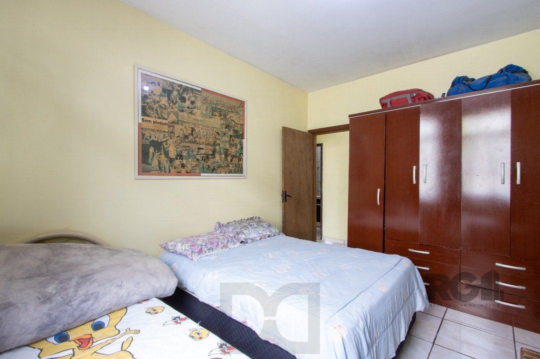 Casa térrea, 3 quartos, 2 banheiros, com pátio no Bairro Cavalhada — foto 18