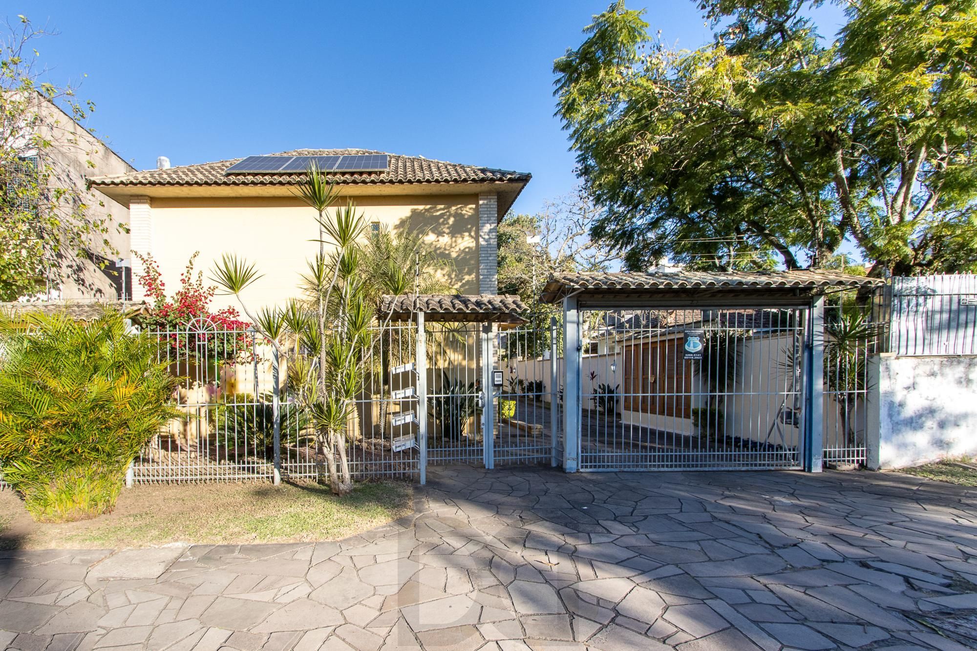 Casa 3 dormitórios, 1 suíte, 2 vagas - Bairro Camaquã — foto 1