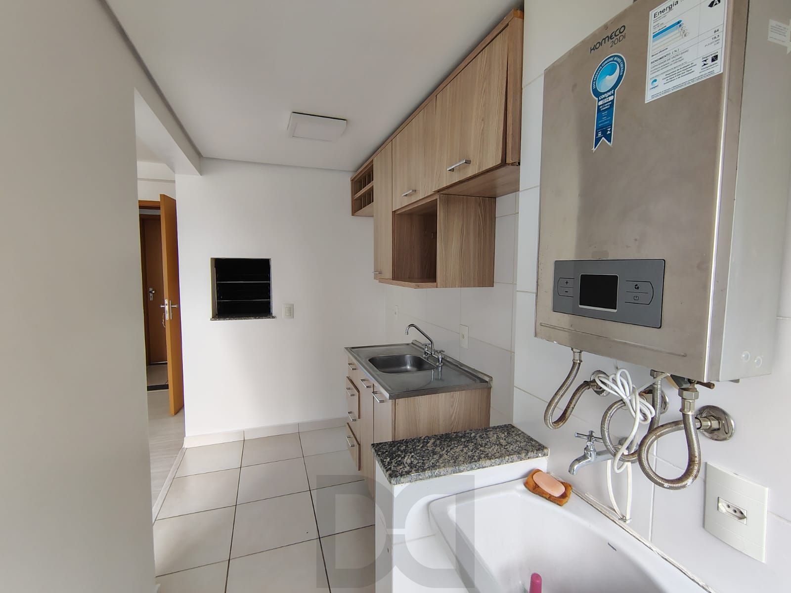 Apartamento de 2 dormitórios, living, cozinha planejada, área de serviço, banheiro social e 1 vaga de garagem escriturada. — foto 7