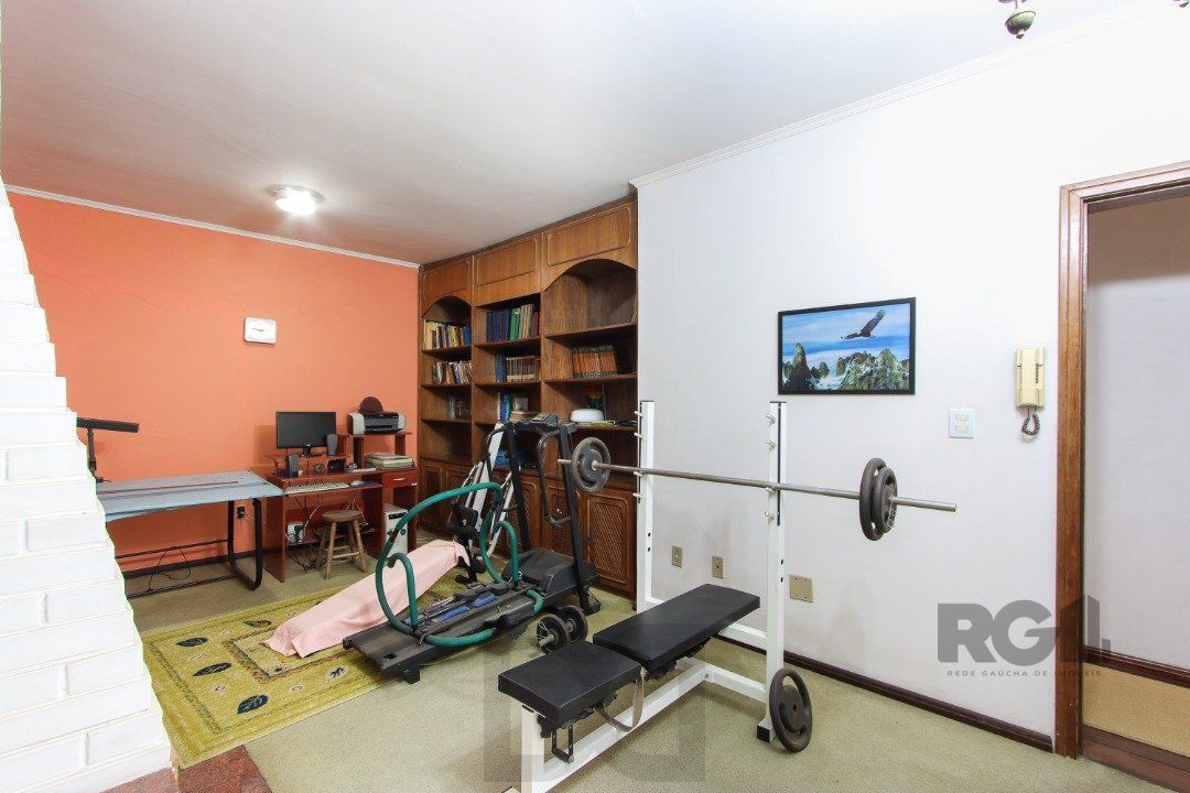 Casa a venda com 03 dormitórios, living 03 ambientes com vista para o Rio. — foto 28