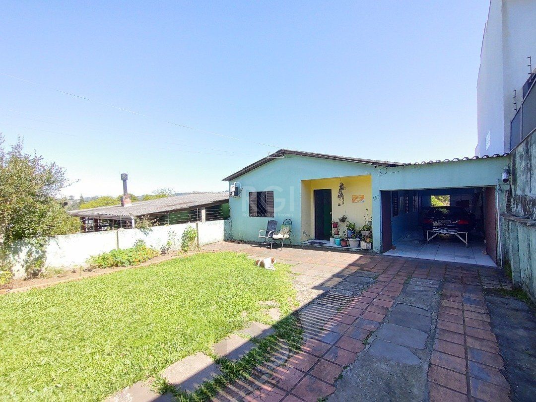 Casa para Venda - 100m², 3 dormitórios, 2 vagas - Lomba do Pinheiro — foto 1